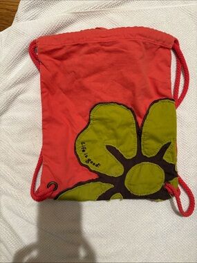 Life Is Good Red Drawstring Backpack with Green Floral Applique